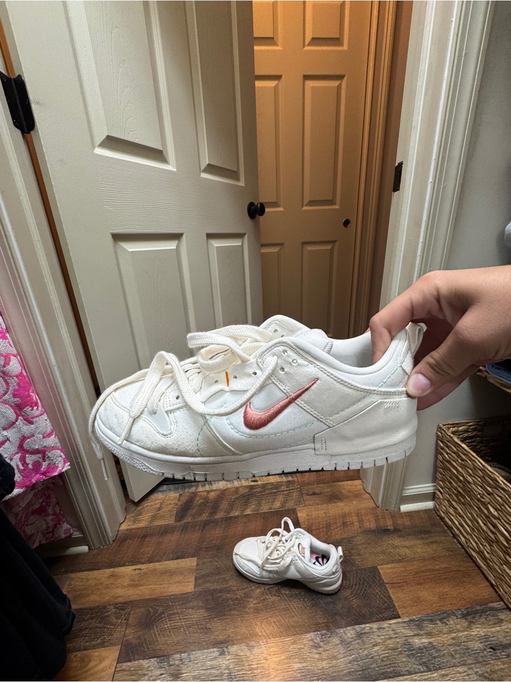 Nike Kids White Sneakers with Metallic Pink Swoosh